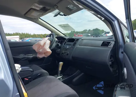 2009 Nissan Versa 1.8Sl z USA, uszkodzony, nr VIN 3N1BC13E09L410085